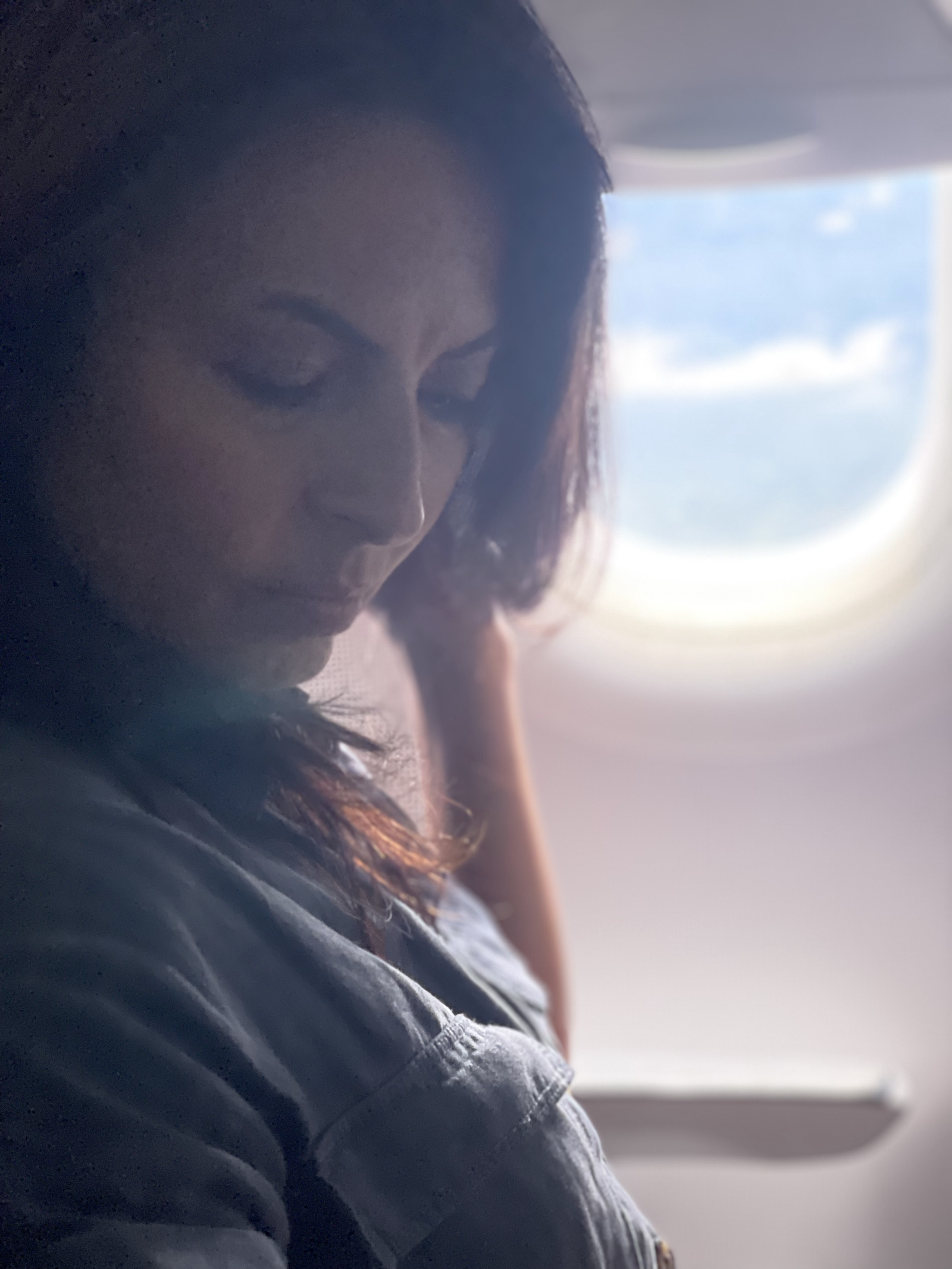 Lisa Leyva in a quiet moment by the window
